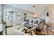 Comfortable room featuring a couch, bed, and decor at 6187 Kelly Carlin Way, Norcross, GA 30071