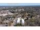 Aerial view near Healthcare, showcasing modern townhomes surrounded by lush greenery and nearby amenities at 1110 Briar Cove Cir, Atlanta, GA 30329
