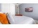 Bedroom featuring gray walls, tan carpet, and mounted television at 1110 Briar Cove Cir, Atlanta, GA 30329