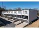Modern townhome complex with a sleek design, balconies, and well-maintained landscaping at 1110 Briar Cove Cir, Atlanta, GA 30329