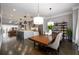 Open concept kitchen with stainless steel appliances, a large island, and hardwood floors at 1110 Briar Cove Cir, Atlanta, GA 30329