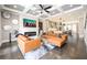 Spacious living room with a fireplace, modern sectional sofa, and an open floor plan at 1110 Briar Cove Cir, Atlanta, GA 30329