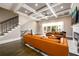 Spacious living room with a cozy fireplace, a large window, and stylish decor at 1110 Briar Cove Cir, Atlanta, GA 30329