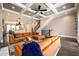 Bright open-concept living room featuring a coffered ceiling, modern furnishings, and hardwood floors at 1110 Briar Cove Cir, Atlanta, GA 30329