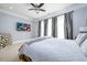 Comfortable Primary suite with a large bed, and TV at 1110 Briar Cove Cir, Atlanta, GA 30329