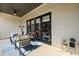 Outdoor patio with comfortable seating, a ceiling fan, and sliding glass doors at 1110 Briar Cove Cir, Atlanta, GA 30329