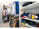 Custom walk-in closet with shelving and hanging racks at 1110 Briar Cove Cir, Atlanta, GA 30329