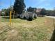 Charming home on a sprawling lot featuring mature trees and a well-maintained lawn at 1510 Bells Ferry Rd, Marietta, GA 30066