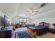 Cozy bedroom with neutral carpeting, dormer windows, and a ceiling fan at 2019 Wiltshire Pl, Snellville, GA 30078
