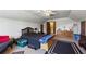 Bedroom with dormer windows, closets, neutral carpeting, and a ceiling fan at 2019 Wiltshire Pl, Snellville, GA 30078