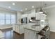 Bright kitchen boasting white cabinetry, stainless steel appliances, and granite countertops at 2022 Raven Way, Atlanta, GA 30341