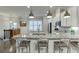 Bright kitchen boasts granite counters, stainless appliances, and seating at the island at 2022 Raven Way, Atlanta, GA 30341
