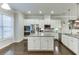 Modern kitchen with stainless steel appliances, granite countertops, and white cabinetry at 2022 Raven Way, Atlanta, GA 30341