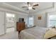 The main bedroom offers lots of space, soft natural light, and neutral finishes at 2022 Raven Way, Atlanta, GA 30341