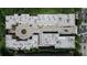 Aerial view of a community features a central courtyard, perimeter roads, and tree-lined streets at 2440 Peachtree Nw Rd # 22, Atlanta, GA 30305