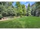 Expansive backyard lawn offering ample space for recreation and outdoor activities, ideal for gatherings at 2440 Peachtree Nw Rd # 22, Atlanta, GA 30305
