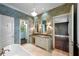 Elegant bathroom suite features dual vanities, a standalone tub, and a walk-in closet entrance at 2440 Peachtree Nw Rd # 22, Atlanta, GA 30305