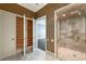 Open bathroom view featuring a shower and closet at 2440 Peachtree Nw Rd # 22, Atlanta, GA 30305