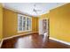 Bright bedroom with hardwood floors and shuttered windows at 2440 Peachtree Nw Rd # 22, Atlanta, GA 30305