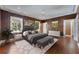 Stately main bedroom featuring hardwood floors, a ceiling fan, recessed lights and windows at 2440 Peachtree Nw Rd # 22, Atlanta, GA 30305