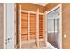 Open view of closet with wood shelves at 2440 Peachtree Nw Rd # 22, Atlanta, GA 30305