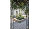A beautifully landscaped courtyard with a central fountain and manicured greenery at 2440 Peachtree Nw Rd # 22, Atlanta, GA 30305