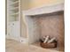 Elegant fireplace with brick hearth and custom stone mantle at 2440 Peachtree Nw Rd # 22, Atlanta, GA 30305