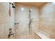 Neutral tile and shower fixture in a modern bathroom at 2440 Peachtree Nw Rd # 22, Atlanta, GA 30305