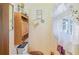 Powder room is decorated with wallpaper and has a window at 3016 Deshong Dr, Stone Mountain, GA 30087