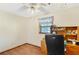 Functional bedroom with vintage ceiling fan and natural light at 3016 Deshong Dr, Stone Mountain, GA 30087
