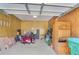 A garage features a motorcycle, boxes, and a storage cabinet at 3016 Deshong Dr, Stone Mountain, GA 30087