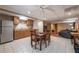 This dining area features tile floors and an open layout connecting to the kitchen and living room at 1030 Blankets Creek Dr, Canton, GA 30114