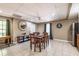 Cozy dining area features a square table with seating for four under a fan with tile flooring at 1030 Blankets Creek Dr, Canton, GA 30114