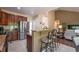 Modern kitchen with stainless steel appliances and a breakfast bar at 1030 Blankets Creek Dr, Canton, GA 30114