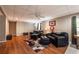 Inviting living room with hardwood floors, comfortable seating, and a ceiling fan at 1030 Blankets Creek Dr, Canton, GA 30114