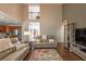 Open concept living area with kitchen view and vaulted ceiling at 1030 Blankets Creek Dr, Canton, GA 30114