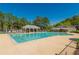 Community pool with surrounding lounge area at 1030 Blankets Creek Dr, Canton, GA 30114