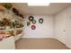 Spacious storage closet with custom shelving solutions ideal for organized flower and wreath storage at 1030 Blankets Creek Dr, Canton, GA 30114