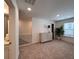 Spacious bedroom with carpet, neutral walls, and staircase access near a window at 1800 Emory Ln # 98, Conyers, GA 30013
