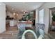 Inviting dining area featuring stylish chairs, a glass-top table, and views into the kitchen at 1800 Emory Ln # 98, Conyers, GA 30013