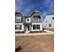 Charming two-story townhome with a well-manicured front yard and painted brick at 1800 Emory Ln # 98, Conyers, GA 30013