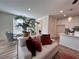 Welcoming living room with contemporary furniture, a dining nook, and easy access to the kitchen at 1800 Emory Ln # 98, Conyers, GA 30013