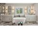 Bright bathroom with a soaking tub, double vanity, marble floors, and elegant fixtures at 2591 Apple Valley Rd, Brookhaven, GA 30319