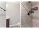 This bathroom has a shower with dark fixtures and large tiles at 1661 Paddlewheel Dr, Marietta, GA 30062