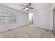 Large primary bedroom featuring a window and ceiling fan at 1661 Paddlewheel Dr, Marietta, GA 30062