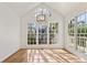 Bright dining area with a modern light fixture and large windows at 1661 Paddlewheel Dr, Marietta, GA 30062