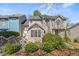 Charming townhome featuring a well-maintained front yard and inviting architectural details at 1661 Paddlewheel Dr, Marietta, GA 30062