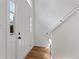 Bright foyer with light wood floors and a stairway at 1661 Paddlewheel Dr, Marietta, GA 30062