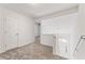 Hallway landing features new carpet, leading to a stairwell with natural light at 1661 Paddlewheel Dr, Marietta, GA 30062