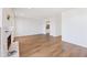 Open-concept living area featuring wood floors and a fireplace at 1661 Paddlewheel Dr, Marietta, GA 30062